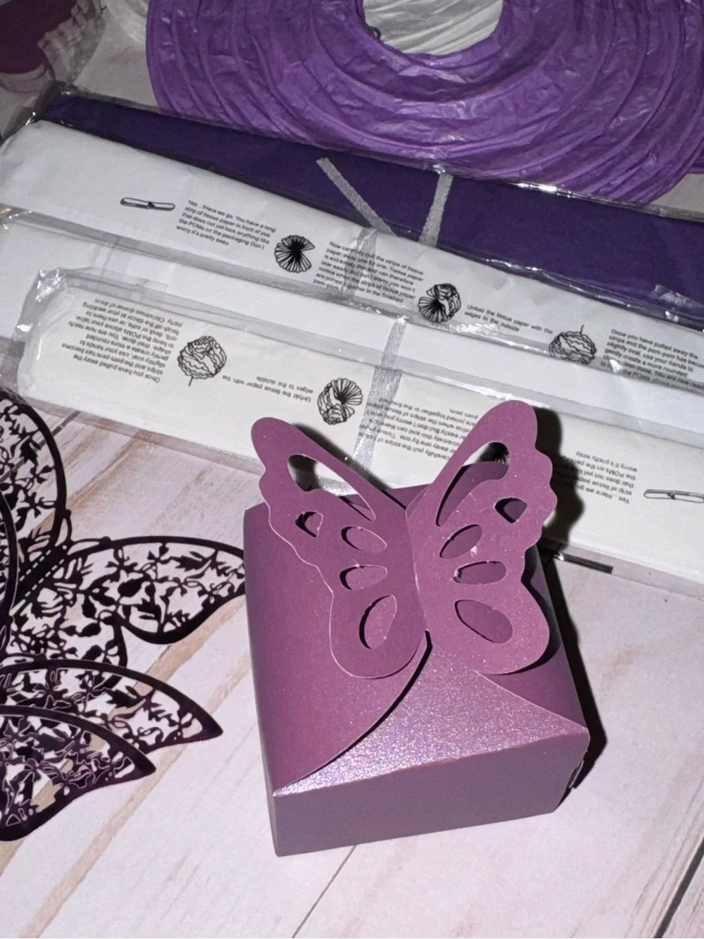 Purple and white party supplies
